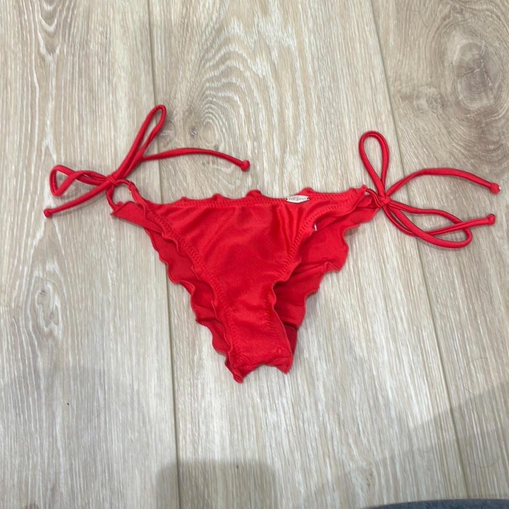 Luli Fama red bikini bottoms